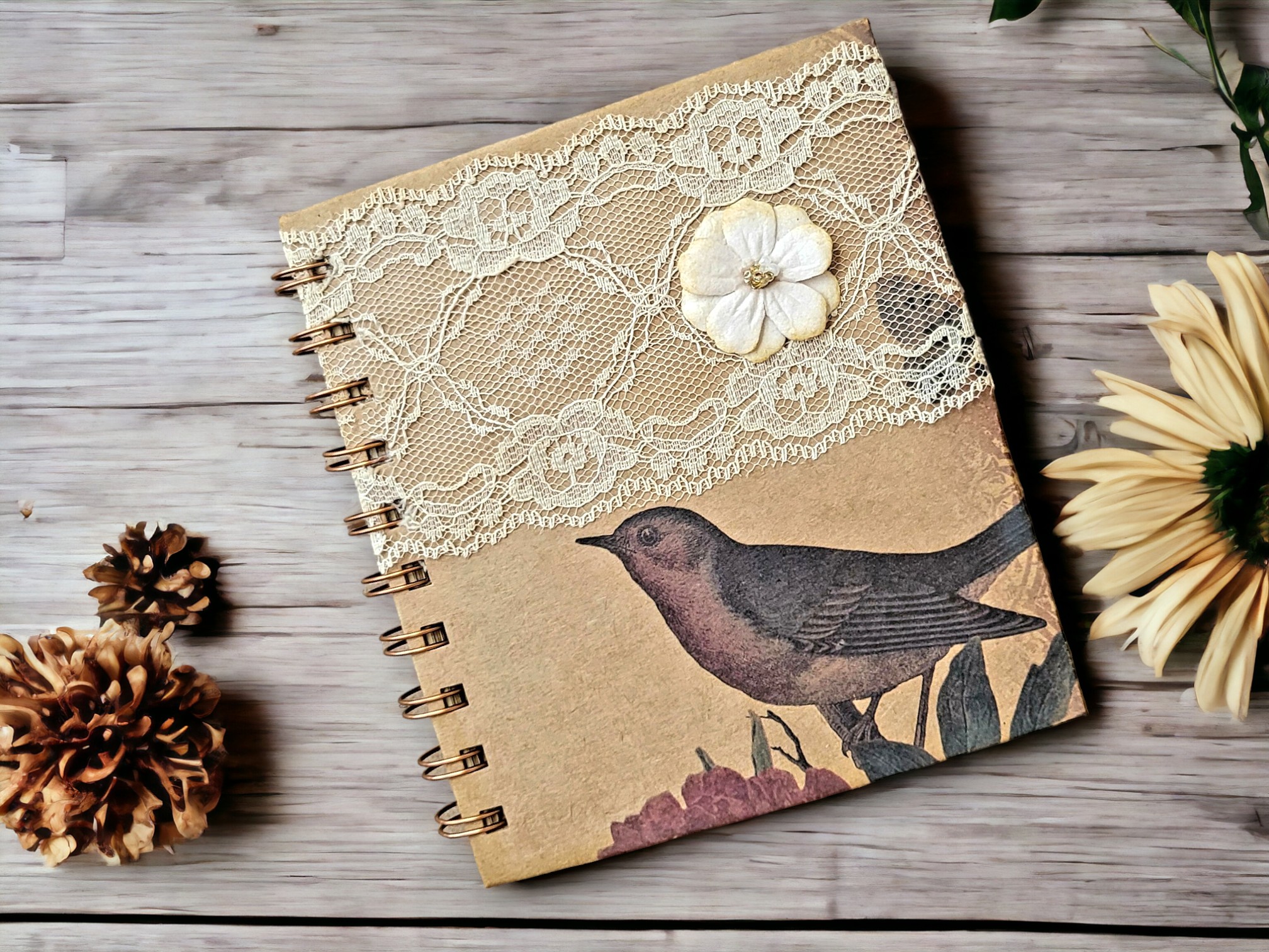 A handmade blank vintage ephemera junk journal that is perfect for someone new to junk journaling