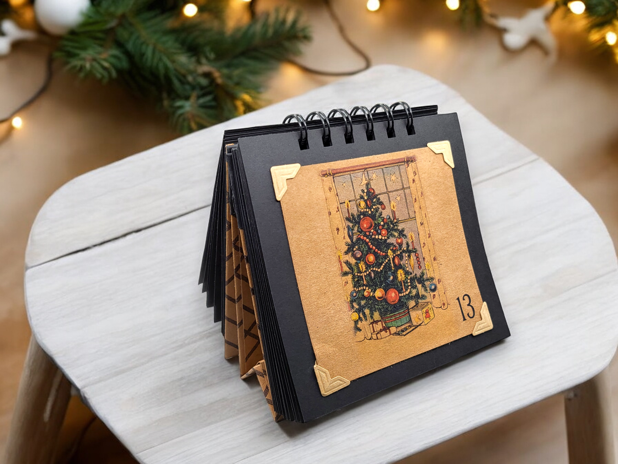 a kraft paper vintage ephemera christmas countdown calendar
